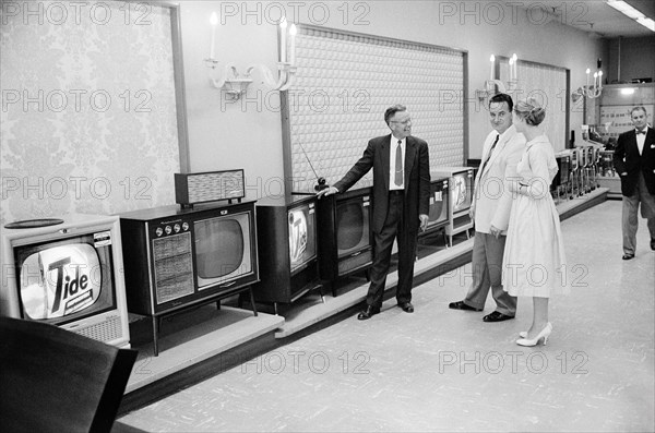 Couple shopping for a television, Woodward & Lothrop department store, Washington, D.C., USA, Marion S. Trikosko, U.S. News & World Report Magazine Photograph Collection, August 1958