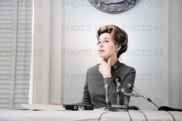 Phyllis Schlafly, chairwoman of the Stop ERA organization, seated at table, behind microphones, Marion S. Trikosko, U.S. News & World Report Magazine Photograph Collection, February 1976