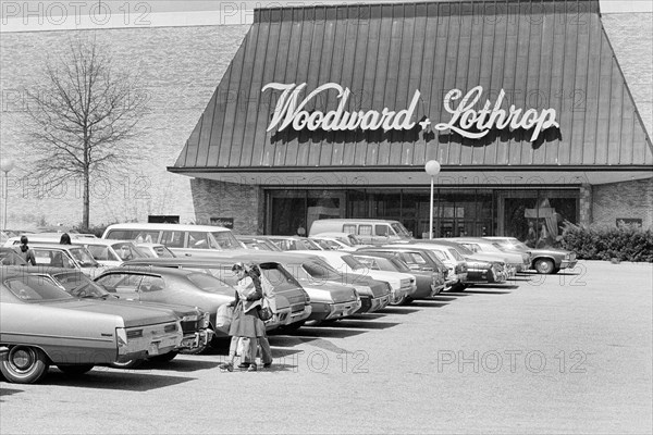 Group of people in parking lot outside Woodward & Lothrop department store, Tysons Corner Mall, Tysons Corner, Virginia, USA, Marion S. Trikosko, U.S. News & World Report Magazine Photograph Collection, April 1976