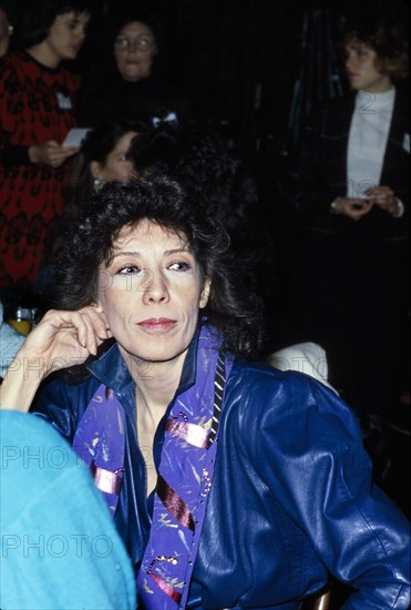 American actress Lily Tomlin, seated portrait while attending Ms. Magazine Woman of the Year Awards, New York City, New York, USA, Bernard Gotfryd, 1986