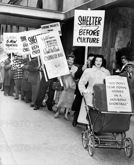 Mrs. Ellan Levitt leading picket line protesting proposed destruction of Lincoln Square neighborhood to build Lincoln Center, New York City, New York, USA, Phil Stanziola, New York World-Telegram and the Sun Newspaper Photograph Collection, 1956