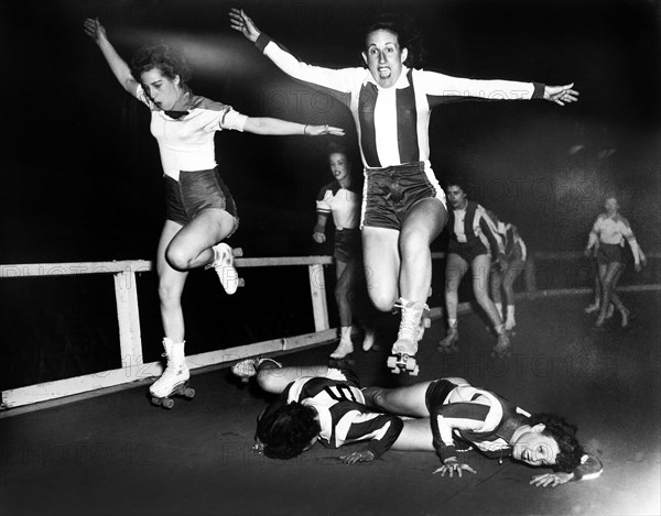 Two women's league roller derby skaters leap over two who have fallen, Al Aumuller, New York World-Telegram and the Sun Newspaper Photograph Collection, March 1950