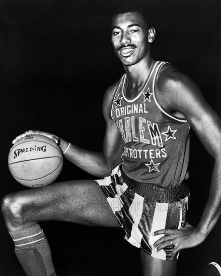 American professional basketball player Wilt Chamberlain wearing Harlem Globetrotters uniform, Fred Palumbo, New York World-Telegram and the Sun Newspaper Photograph Collection, 1959