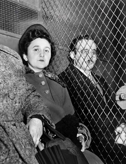 Ethel and Julius Rosenberg, separated by heavy wire screen as they leave U.S. Court House after being found guilty of espionage by jury, New York City, New York, USA, Roger Higgins, New York World-Telegram and the Sun Newspaper Photograph Collection, March 1951