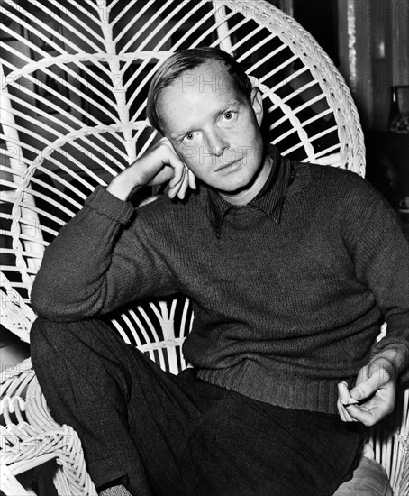 Truman Capote (1924-1984), American novelist, screenwriter, playwright and actor, half-length seated portrait holding cigarette in left hand, Roger Higgins, New York World-Telegram and the Sun Newspaper Photograph Collection, 1959