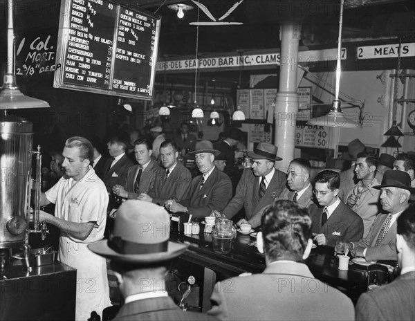 Group of men eating and drinking at Pete's Bar, Washington Market, New York City, New York, USA, Al Aumuller, New York World-Telegram and the Sun Newspaper Photograph Collection, 1950