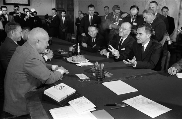 U.S. Vice President Richard Nixon, Dr. Milton Eisenhower and U.S. Ambassador to the Soviet Union Llewellyn E. Thompson Jr., seated across table from Soviet leader Nikita Khrushchev in his office, Moscow, Soviet Union, Thomas J. O'Halloran, U.S. News & World Report Magazine Photograph Collection, July 1959