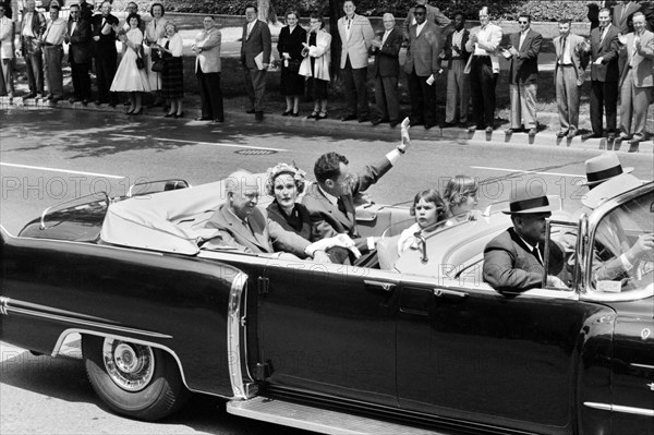 U.S. President Dwight Eisenhower riding in convertible car with U.S. Vice President Richard Nixon, his wife Pat Nixon and their two daughters, Tricia and Julie upon their return from South American trip, Washington, D.C., USA, Thomas J. O'Halloran, U.S. News & World Report Magazine Photograph Collection, May 15, 1958