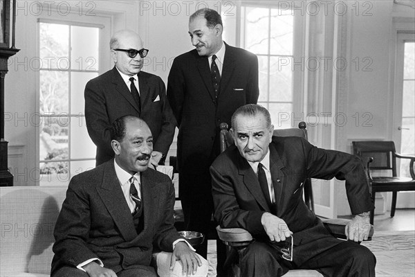 U.S. President Lyndon B. Johnson, seated with Anwar Sadat, President of the National Assembly of Egypt, Washington, D.C., USA, Marion K. Trikosko, U.S. News & World Report Magazine Photograph Collection, February 2, 1966