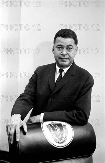 Senator Edward Brooke standing behind chair decorated with Great Seal of the Commonwealth of Massachusetts, Washington, D.C., USA, Warren K. Leffler, U.S. News & World Report Magazine Photograph Collection, January 1967