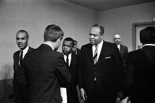 Roy Wilkins, John Lewis shaking hands with Robert F. Kennedy (with his back to the camera), and Whitney Young at the American Society of Newspaper Editors convention, Statler Hilton Hotel, Washington, D.C., USA, Marion K. Trikosko, U.S. News & World Report Magazine Photograph Collection, April 1964,