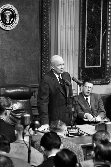 U.S. President Dwight Eisenhower speaking in front of microphones at press conference, Washington, D.C., USA, Warren K. Leffler, U.S. News & World Report Magazine Photograph Collection, January 15, 1958