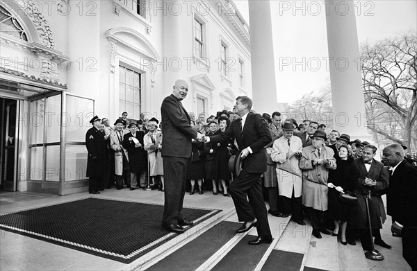 U.S. President Dwight Eisenhower, shaking hands with U.S. President-Elect John Kennedy on the steps of the White House, Washington, D.C., USA, Warren K. Leffler, U.S. News & World Report Magazine Photograph Collection, December 6, 1960