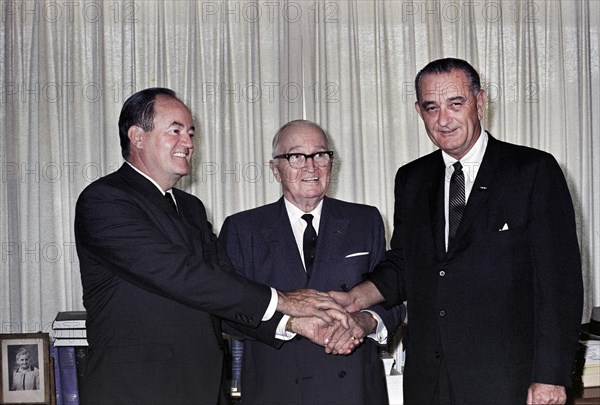 U.S. Vice President Hubert Humphrey, former U.S. President Harry S. Truman, and U.S. President Lyndon B. Johnson during signing of Medicare Bill, Harry S. Truman Library, Independence, Missouri, USA, Yoichi Okamoto, July 30, 1965