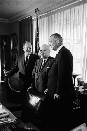 U.S. Vice President Hubert Humphrey, former U.S. President Harry S. Truman, and U.S. President Lyndon B. Johnson during signing of Medicare Bill, Harry S. Truman Library, Independence, Missouri, USA, Yoichi Okamoto, July 30, 1965