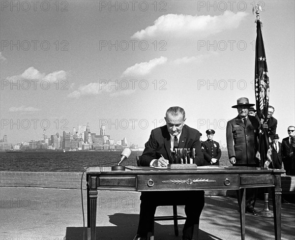 U.S. President Lyndon B. Johnson signing  the Immigration and Nationality Act of 1965, Liberty Island, New York City, New York, USA, Yoichi Okamoto, October 3, 1965