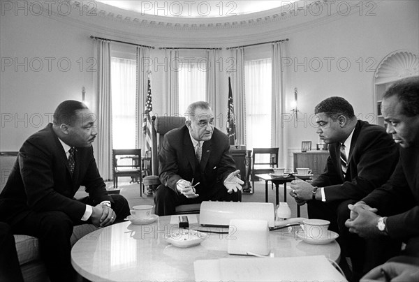 Martin Luther King Jr., U.S. President Lyndon Johnson, Whitney Young, James Farmer, during civil rights meeting, Oval Office, White House, White House, Washington, D.C., USA, Yoichi Okamoto, January 18, 1964