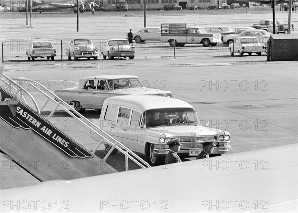 Hearse carrying body of late U.S. President John Kennedy arriving for transfer to Air Force One, Love Field, Dallas, Texas, USA, Cecil Stoughton, White House Photographs, November 22, 1963