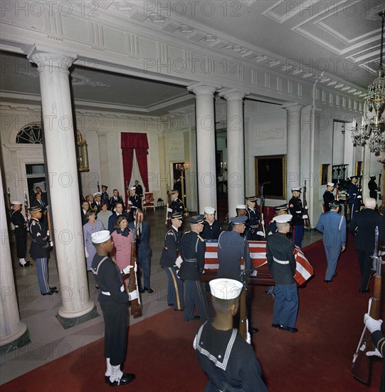 Arrival of late U.S. President John Kennedy’s casket, followed by Jacqueline Kennedy, Robert Kennedy, Jean Kennedy Smith, Ethel Kennedy, Robert McNamara, and others, White House, Washington, D.C., USA, Cecil Stoughton, White House Photographs, November 23, 1963