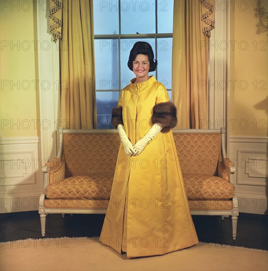 Claudia 'Lady Bird' Johnson, full-length portrait wearing inaugural gown, White House, Washington, D.C., USA, White House Photo Office, January 18, 1965