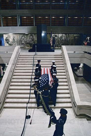 Military officers carrying former U.S. President Lyndon B. Johnson's casket up steps in the Great Hall, The Lyndon B. Johnson Library and Museum, Austin, USA, Frank Wolfe, January 23, 1973