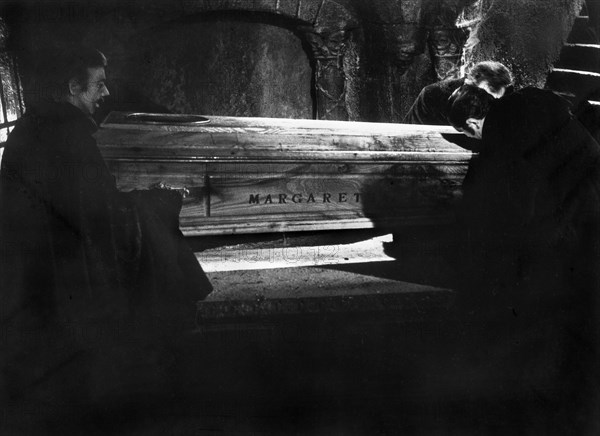 Pallbearers bringing coffin of Doctor Bernard Hichcock's (Robert Flemyng) wife Margaretha to the basement of his laboratory, on-set of the Italian film, "The Horrible Doctor Hichcock", Italian title: "L'orribile segreto del Dr. Hichcock", Warner Bros., 1962