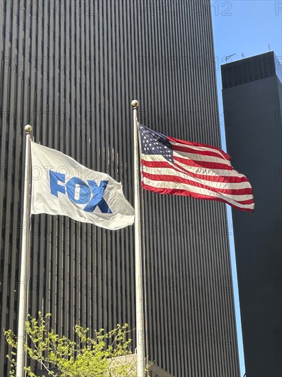 Fox News and American flags flying outside News Corp Building, Avenue of the Americas, New York City, New York, USA