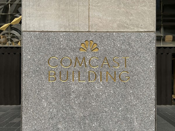 Comcast Building with NBC peacock logo etched in granite on building exterior, New York City, New York City, USA