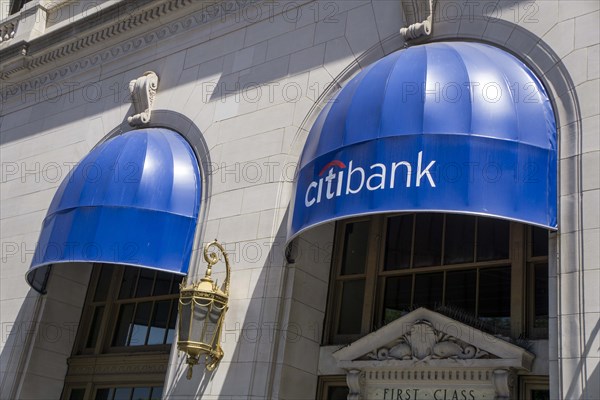 Citibank retail banking office, building exterior with blue awning above windows, New York City, New York, USA