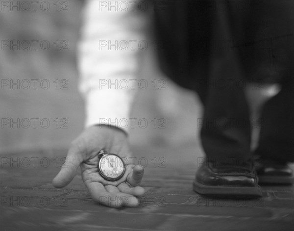 Man holding a pocket watch