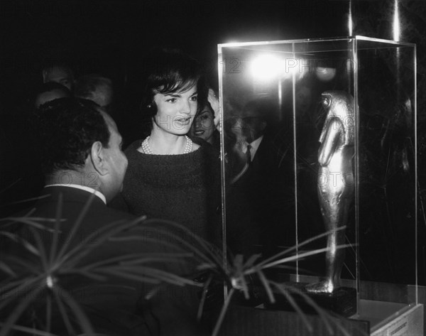 U.S. First Lady Jacqueline Kennedy viewing statuette Tutankhamun Exhibit with Egyptian archaeologist, Dr. Ahmed Fakhry, National Gallery of Art, Washington, D.C., USA, Abbie Rowe, White House Photographs, November 3, 1961