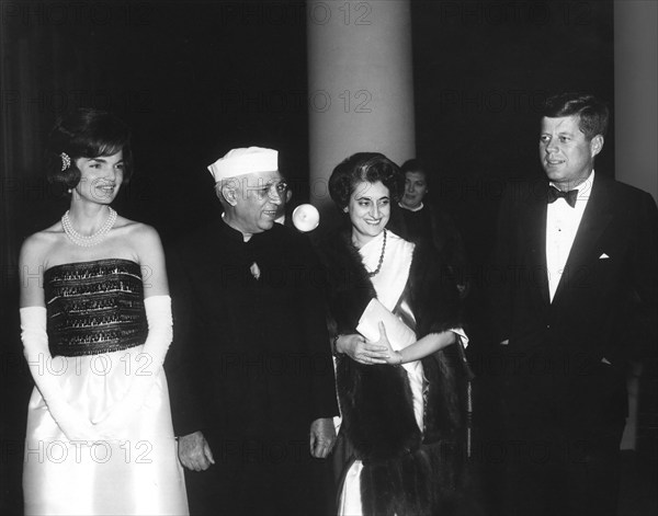 U.S. First Lady Jacqueline Kennedy, Indian Prime Minister Jawaharlal Nehru, Indira Gandhi, and U.S. President John F. Kennedy attending dinner in honor of Prime Minister Nehru North Portico, White House, Washington, D.C., USA, Abbie Rowe, White House Photographs, November 7, 1961