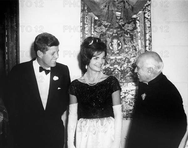 U.S. President John F. Kennedy, U.S. First Lady Jacqueline Kennedy, and Prime Minister of India Jawaharlal Nehru at dinner given by Prime Minister Nehru in honor of President Kennedy, Indian Embassy, Washington, D.C., USA, Abbie Rowe, White House Photographs, November 9, 1961