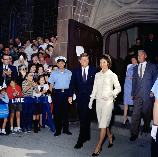 U.S. President John F. Kennedy and First Lady Jacqueline Kennedy leaving St. Mary's church after attending Mass, Newport, Rhode Island, USA, Robert Knudsen, White House Photographs, October 1, 1961