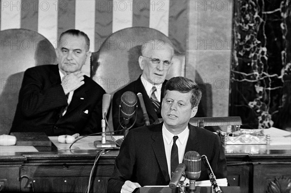 U.S. President John Kennedy delivering his annual State of the Union address to the Congress with U.S. Vice President Lyndon B. Johnson and Speaker of the House of Representatives John W. McCormack in background, House of Representatives Chamber, United States Capitol Building, Washington, D.C., USA, Cecil Stoughton, White House Photographs, January 11, 1962