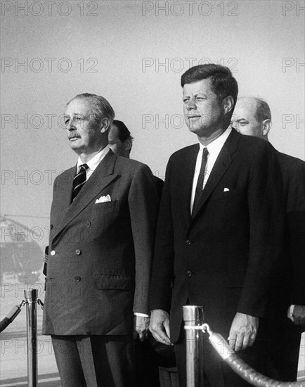 U.S. President John F. Kennedy attending arrival ceremonies in honor of British Prime Minister Harold Macmillan (left), Andrews Air Force Base, Prince George's County, Maryland, USA, Abbie Rowe, White House Photographs, April 27, 1962