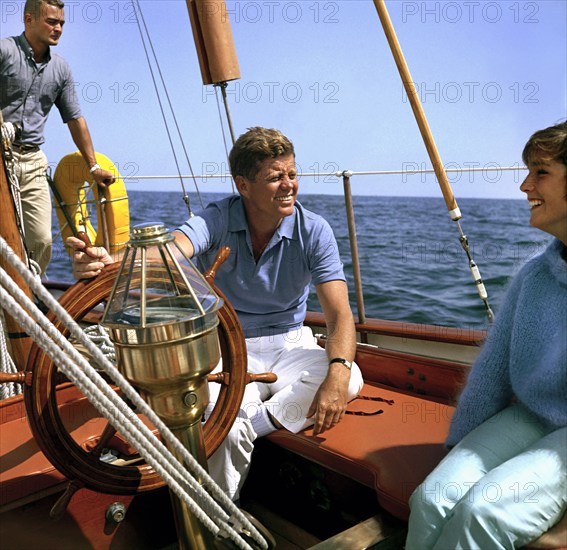 U.S. President John F. Kennedy sitting aboard U.S. Coast Guard boat Manitou, Narragansett Bay, Newport, Rhode Island, USA, Robert Knudsen, White House Photographs, August 26, 1962