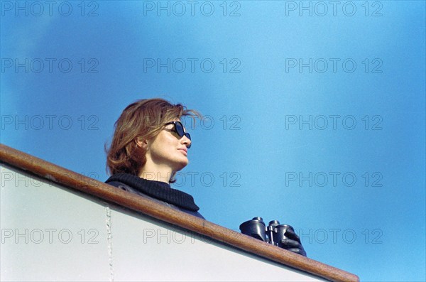 U.S. First Lady Jacqueline Kennedy watching fourth race of America's Cup from aboard USS Joseph P. Kennedy, Jr., Newport, Rhode Island, USA, Cecil Stoughton, White House Photographs, September 22, 1962