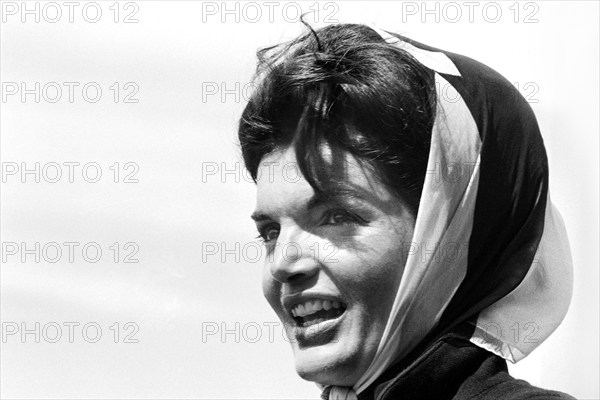 Close-up portrait of U.S. First Lady Jacqueline Kennedy watching first race of America's Cup from aboard USS Joseph P. Kennedy, Jr., Newport, Rhode Island, USA, Cecil Stoughton, White House Photographs, September 15, 1962