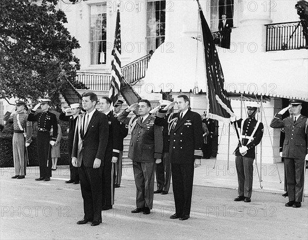 U.S. President John F. Kennedy (left, foreground) attending military reception in honor of recipients of Congressional Medal of Honor, South Portico, White House, Washington, D.C., USA, Abbie Rowe, White House Photographs, May 2, 1963