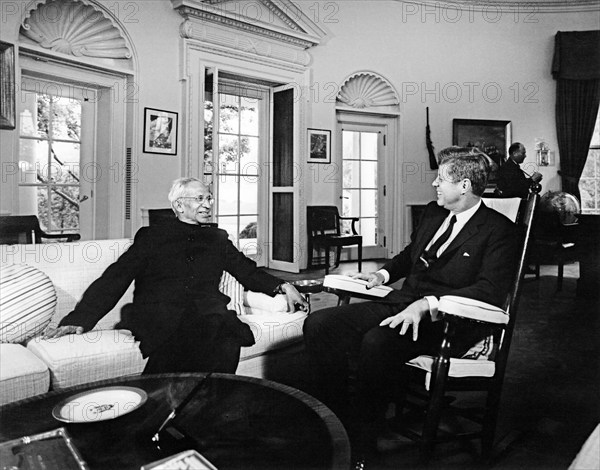 U.S. President John F. Kennedy (in rocking chair) meeting with President of India, Dr. Sarvepalli Radhakrishnan, Oval Office, White House, Washington, D.C., USA, Abbie Rowe, White House Photographs, June 3, 1963