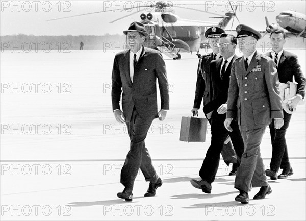 U.S. President John F. Kennedy walking to board flight to attend centennial ceremonies at Boston College, Andrews Air Force Base, Frederick County, Maryland, USA, Cecil Stoughton, White House Photographs, April 20, 1963