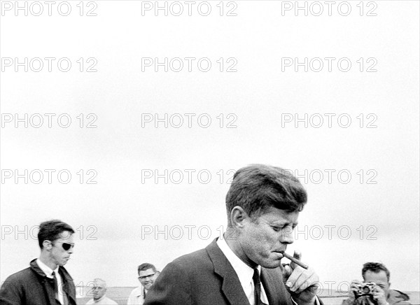 U.S. President John F. Kennedy smoking a cigar, Hyannis Port, Massachusetts, USA, Cecil Stoughton, White House Photographs, May 11, 1963