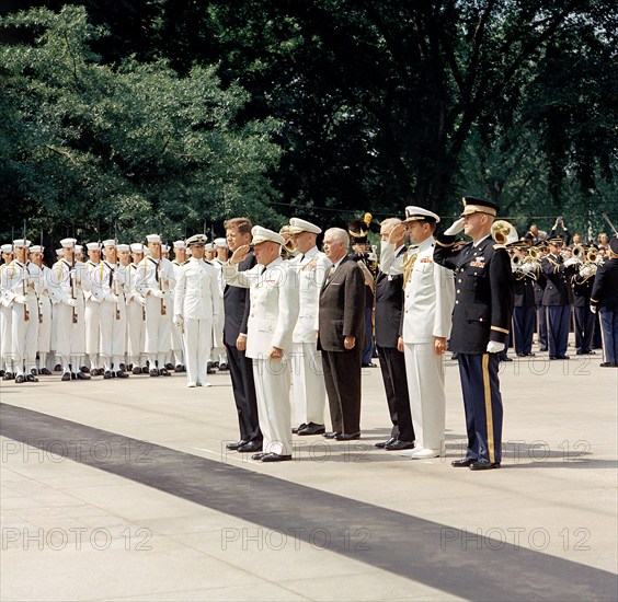 U.S. President John F. Kennedy and others standing at attention at Tomb of the Unknown Soldier during Memorial Day ceremonies, Arlington National Cemetery, Arlington, Virginia, USA, Cecil Stoughton, White House Photographs, May 30, 1963