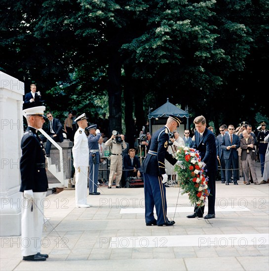 U.S. President John F. Kennedy placing wreath at Tomb of the Unknown Soldier during Memorial Day ceremonies, Arlington National Cemetery, Arlington, Virginia, USA, Cecil Stoughton, White House Photographs, May 30, 1963