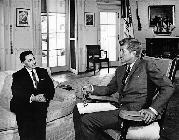 U.S. President John F. Kennedy (in rocking chair) meeting with newly-appointed Ambassador of Afghanistan, Dr. Abdul Majid, Oval Office, White House, Washington, D.C., USA, Robert Knudsen, White House Photographs, August 21, 1963