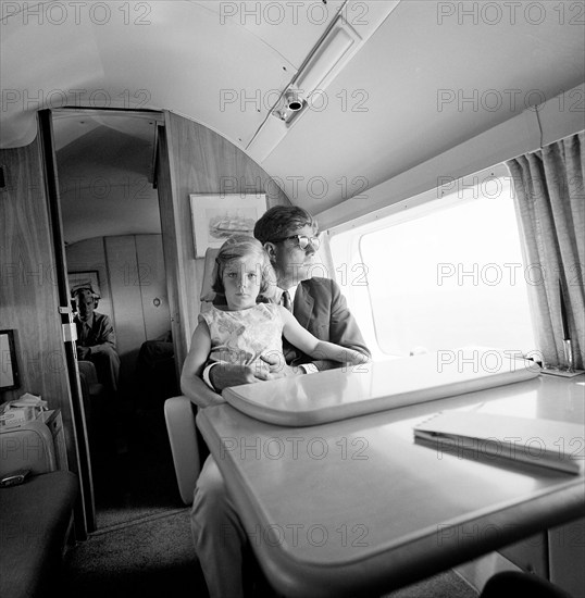 U.S. President John F. Kennedy and his daughter, Caroline Kennedy, sitting aboard Marine One enroute from Hyannis Port to Otis Air Force Base, Cape Cod, Massachusetts, USA, Cecil Stoughton, White House Photographs, Augus 12, 1963