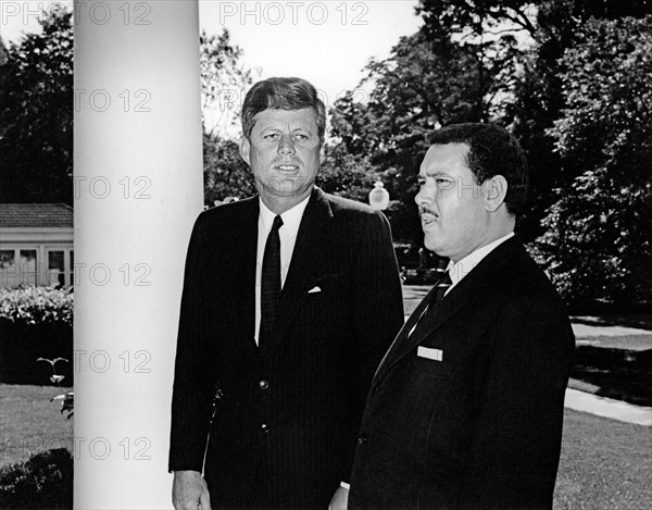 U.S. President John F. Kennedy meeting with Prime Minister of Libya, Mohieddin Fikini, west wing colonnade of White House, Washington, D.C., USA, Abbie Rowe, White House Photographs, September 30, 1963