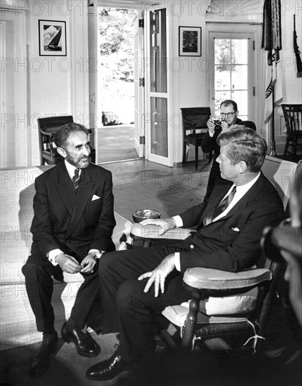 U.S. President John F. Kennedy (in rocking chair) meeting with Emperor of Ethiopia, Haile Selassie I, Oval Office, White House, Washington, D.C., Abbie Rowe, White House Photographs, October 1, 1963