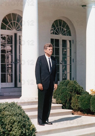 U.S. President John F. Kennedy standing on steps of Rose Garden, White House, Washington, D.C., USA, Robert Knudsen, White House Photographs, October 10, 1963